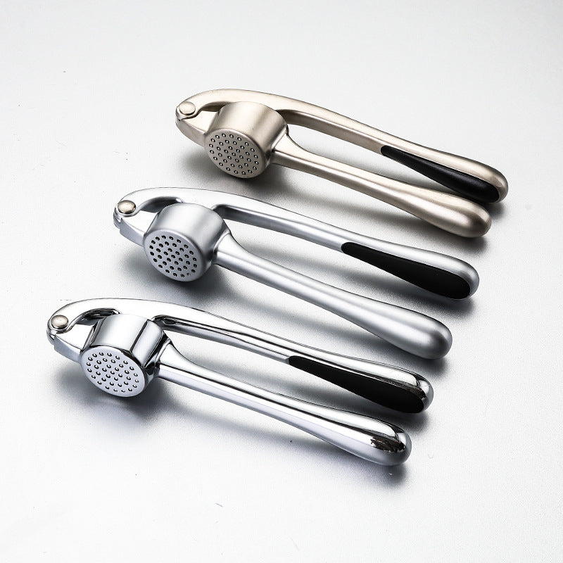 Hachoir à ail en métal avec éplucheur et brosse