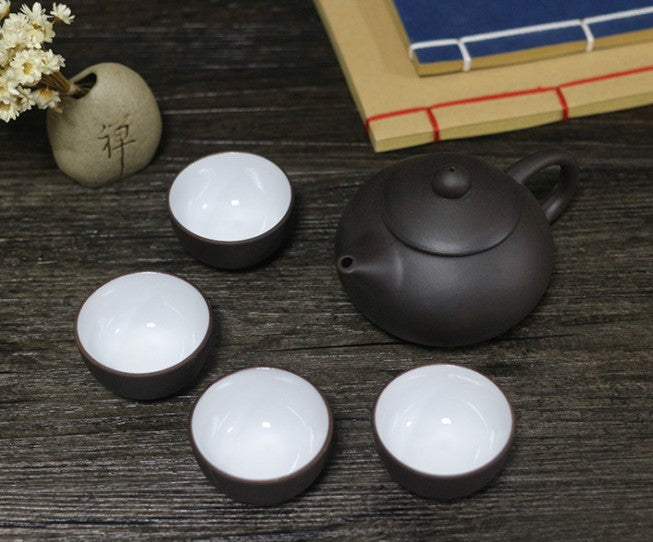 Théière en argile violette