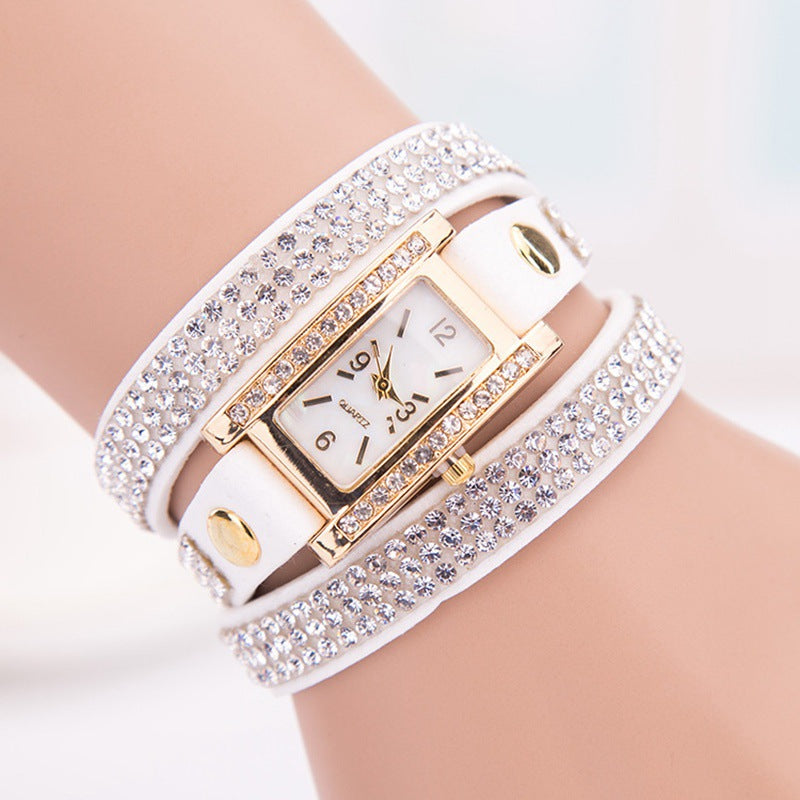 Montre-bracelet en cuir tressé avec strass