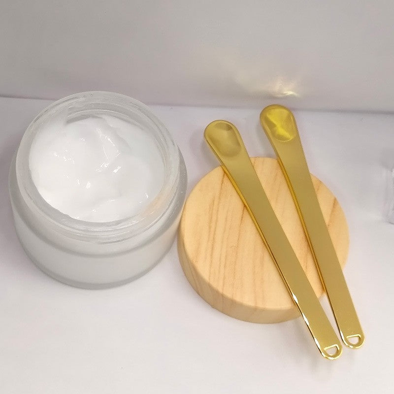 Spatule à crème pour le visage en métal à long manche