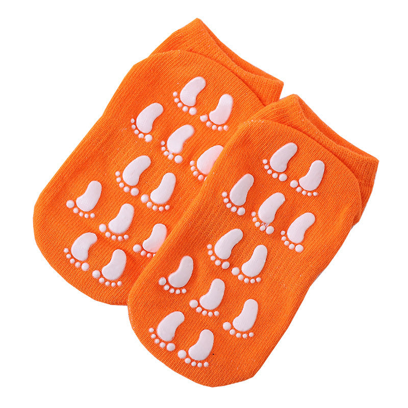 Chaussettes adhésives blanches antidérapantes pour bébé