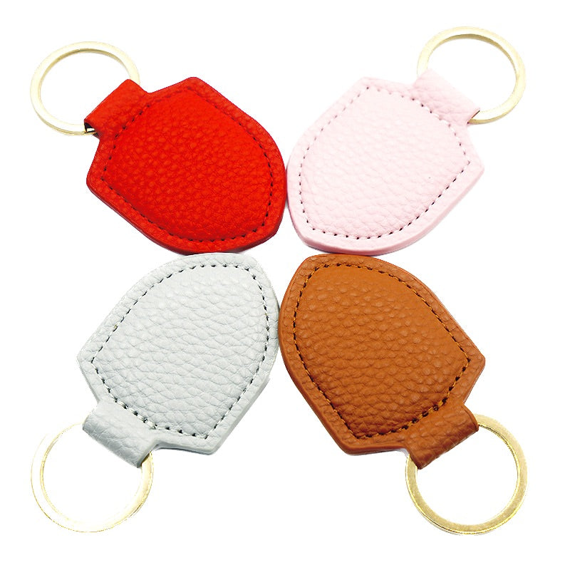 Porte-clés en cuir synthétique en forme de bouclier