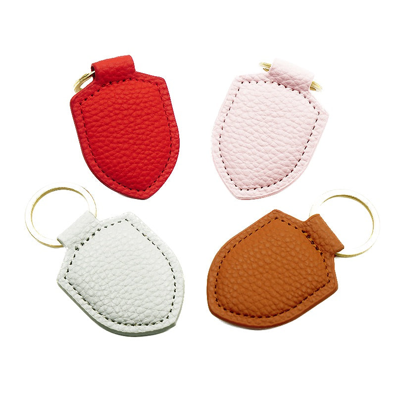 Porte-clés en cuir synthétique en forme de bouclier