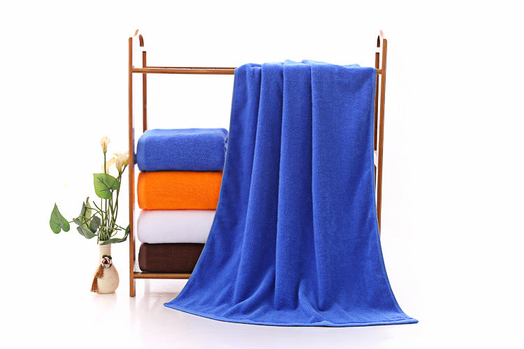 Serviette de plage en tissu éponge