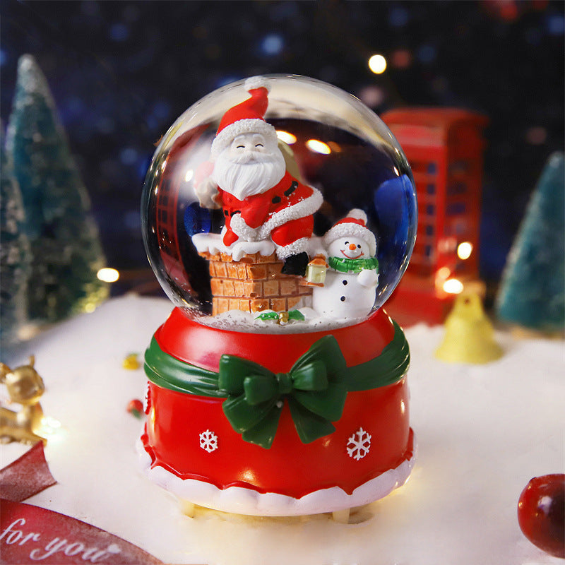 Boule à neige de Noël avec lumière et musique
