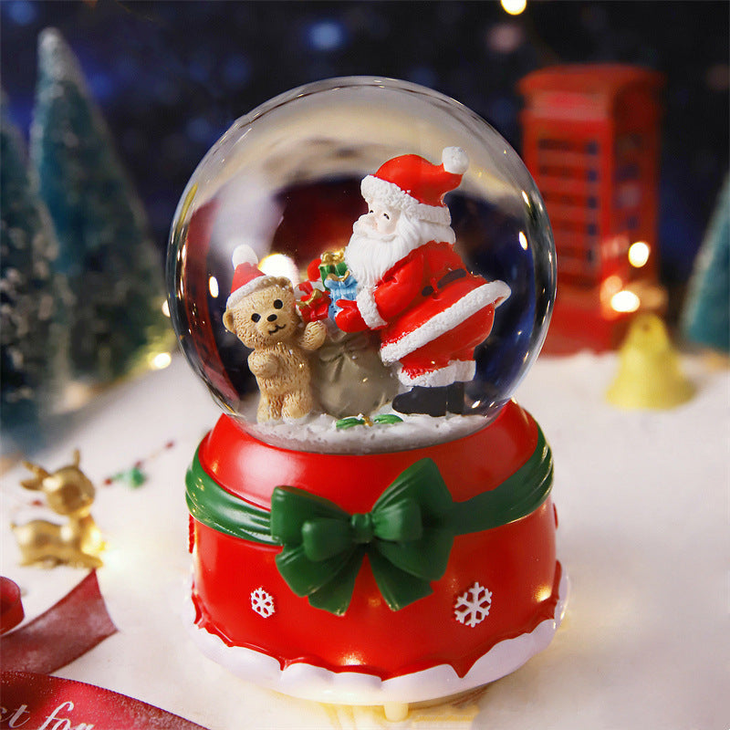 Boule à neige de Noël avec lumière et musique