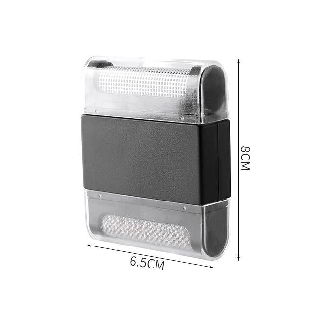 Appareil anti-peluches à deux têtes