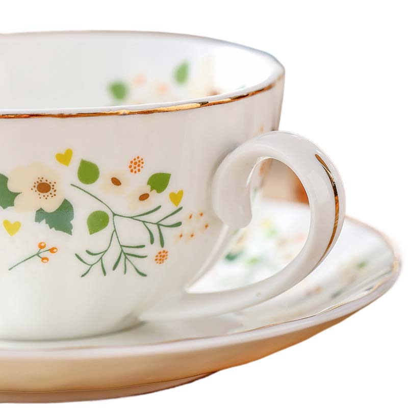 Ensemble théière avec tasse et soucoupe