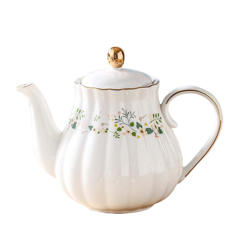 Ensemble théière avec tasse et soucoupe