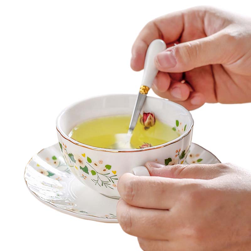 Ensemble théière avec tasse et soucoupe