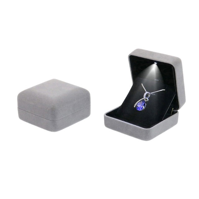 Coffret à collier en velours avec LED