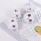 Juego de taza de cerámica con cuchara 