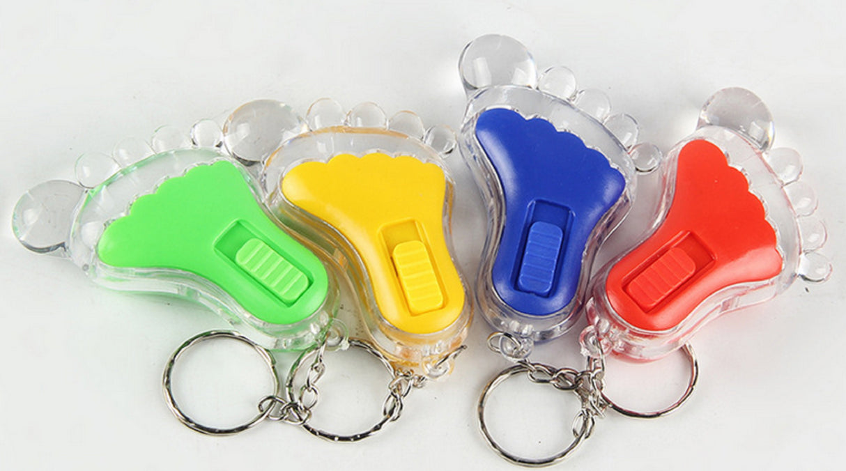 Porte-clés lumineux à LED en forme de pied 