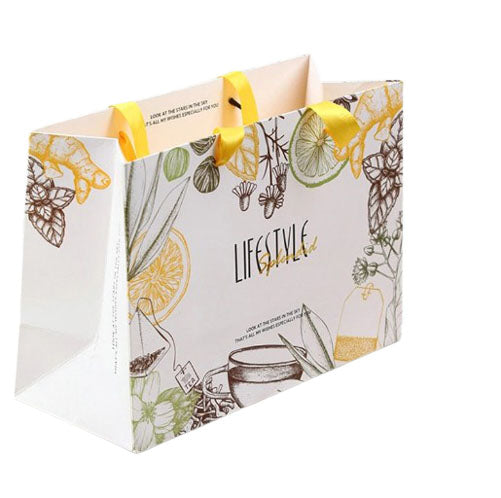 Sac cadeau en papier avec poignée 